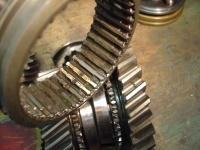  Outer ring of the later 1st/2nd hub, and splines with indents which mesh with the small dog teeth seen below